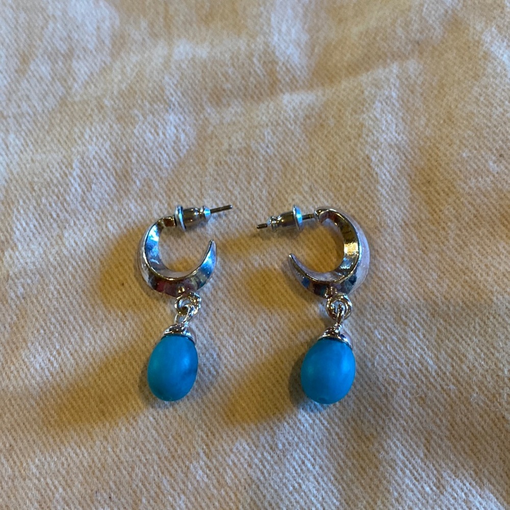 Dainty silver C loops with small turquoise dangle.